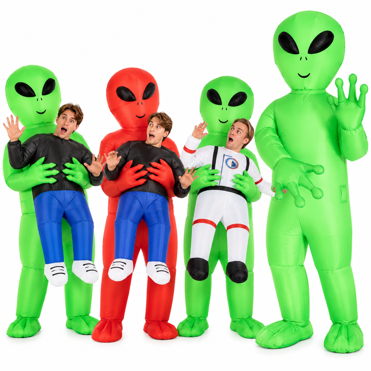 Several friends each wearing a different inflatable green alien costume, one holding a giant standalone alien
