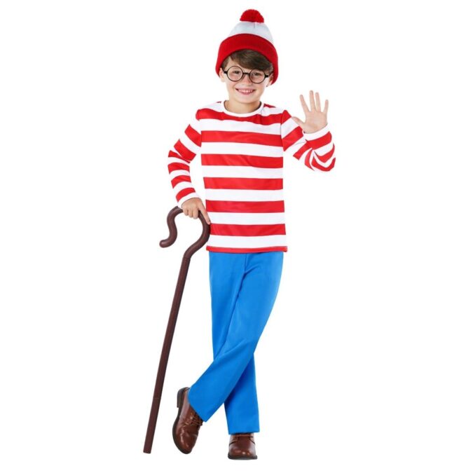 Boy wearing a red and white striped long-sleeve top, blue trousers, a red and white bobble beanie hat and round glasses, holding a wooden cane and waving