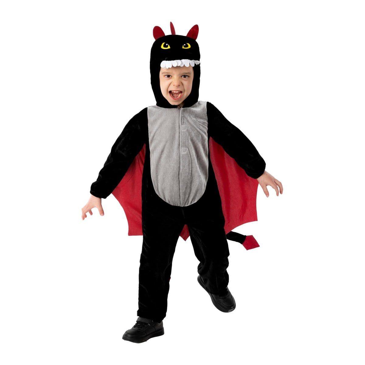 Young child in the Kids Dragon Costume, a black plush hooded jumpsuit with a grey belly panel, felt eyes, teeth and red horns on the hood, and small red wings under the arms