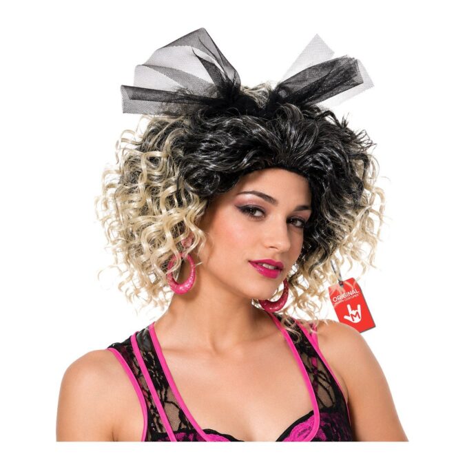 Woman wearing an 80s pop star wig with big, loose blonde curls, styled with bright pink hoop earrings