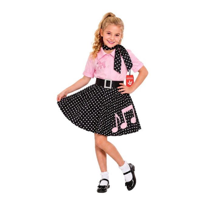 Girl in a 1950s rock and roll costume: pink shirt-style top with a poodle motif, buckled black belt, polka dot skirt with music notes and a spotted scarf