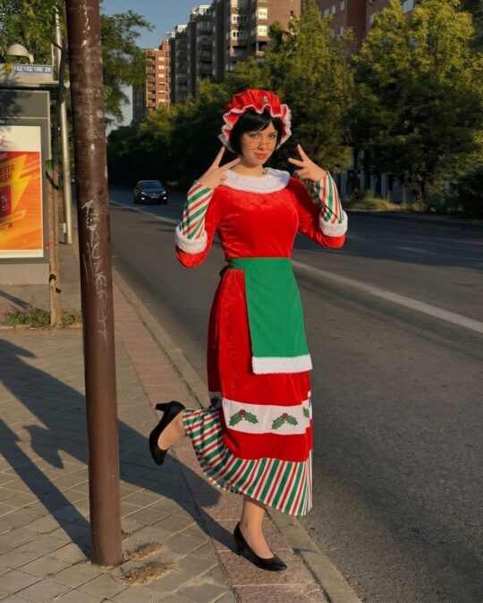 Women's Traditional Mrs Claus Costume worn by a model, lifestyle photo