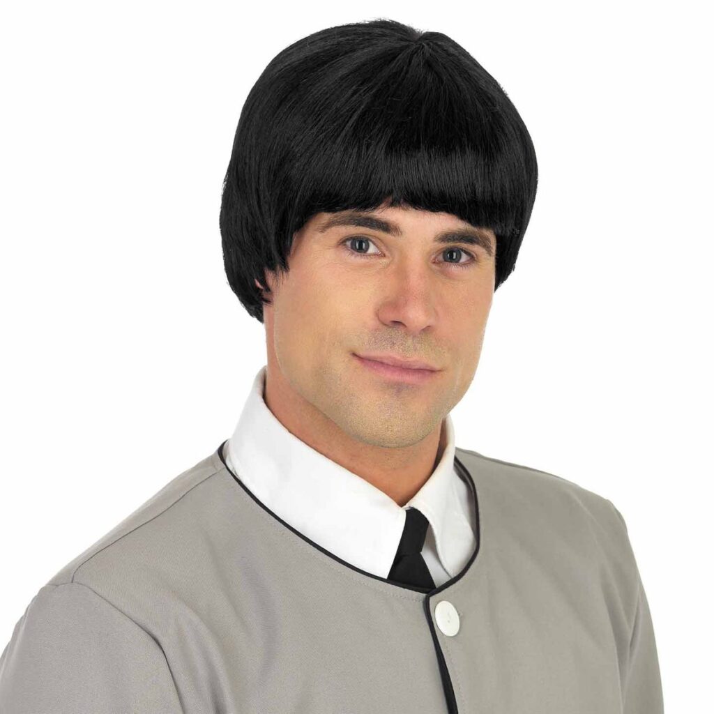 Black 60s mop-top bowl-cut wig worn with a plain grey jacket 