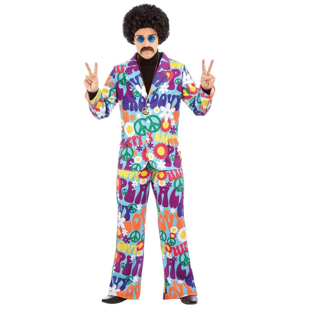 Man in a pale blue 60s hippie suit costume printed with peace signs and flowers, wearing a peace medallion necklace Filename: mens-groovy-hippie-suit-showcase