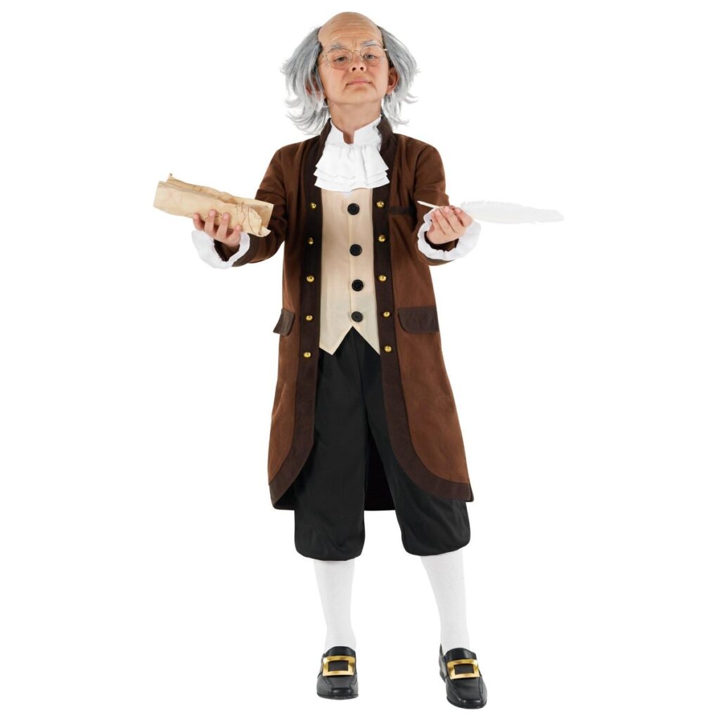 Child in a brown colonial statesman costume with a cream vest front, white jabot bib, dark knee breeches, white socks and buckled shoes