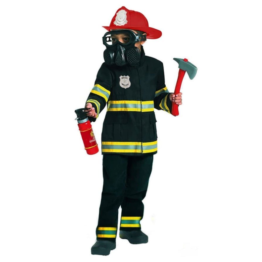 Boy in a black firefighter jacket and trousers with yellow and silver reflective stripes, a red helmet, a black breathing mask, holding a toy axe and a toy fire extinguisher