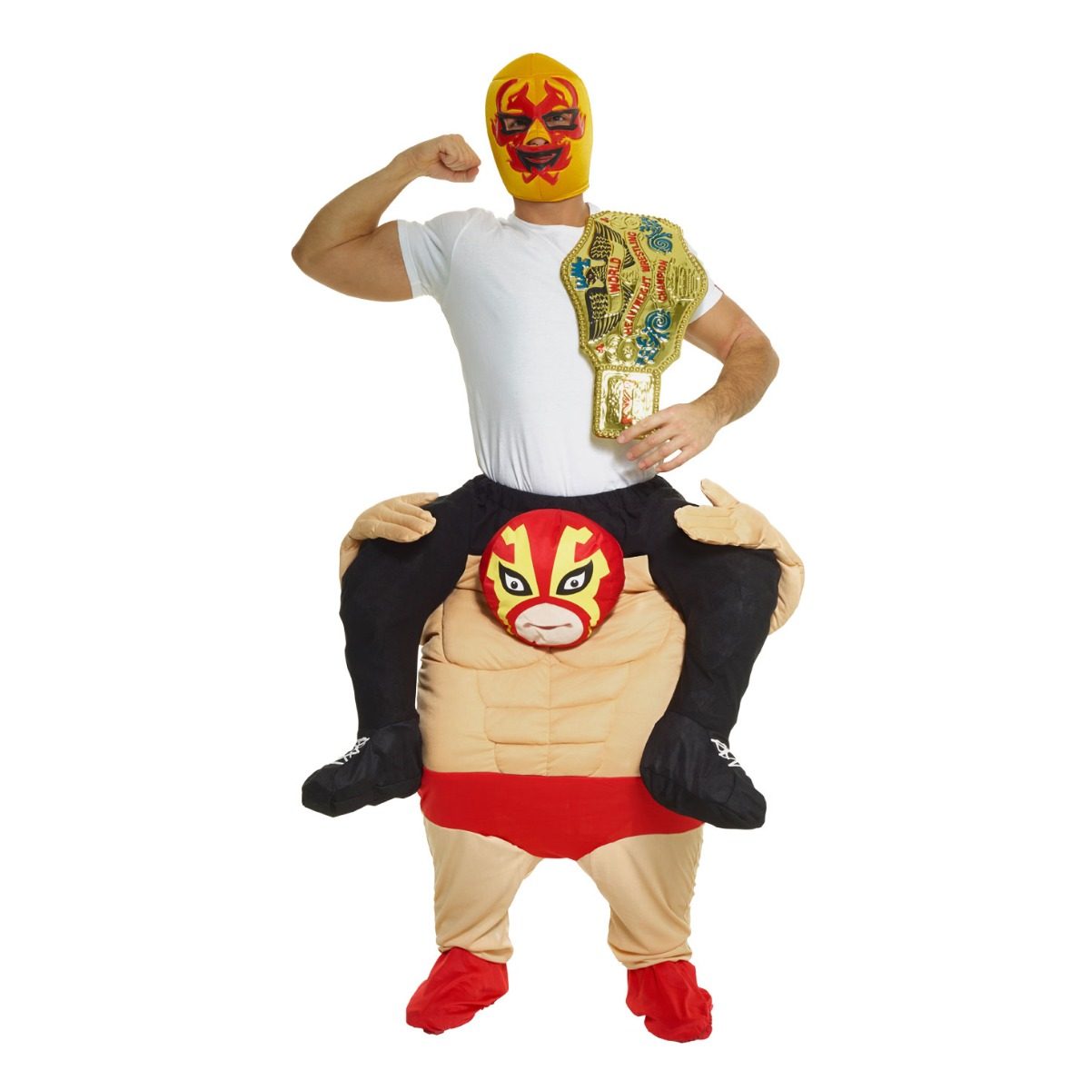 Man in a plain t-shirt and luchador mask standing behind a masked wrestler figure with a red mask, muscular torso and red trunks, dangling black-booted legs