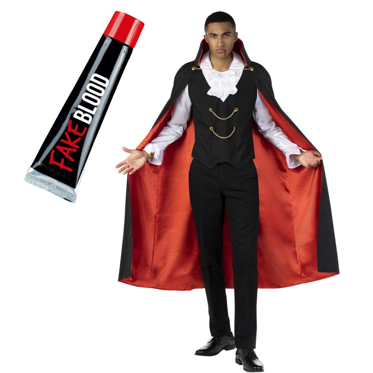 Man in the same black and red vampire cape costume, wearing fangs with a thin line of fake blood at the corner of his mouth, next to a tube of fake blood