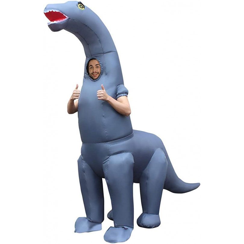 Adult in a giant green inflatable diplodocus dinosaur costume with a built-in fan