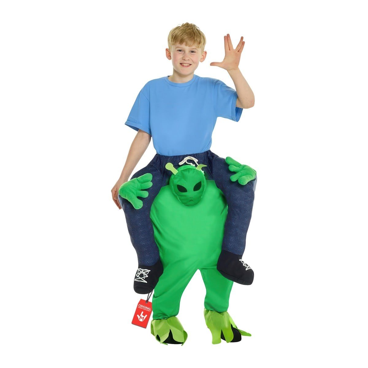Boy wearing a piggyback rig so a green alien plush figure with mitten hands appears to be riding on his back
