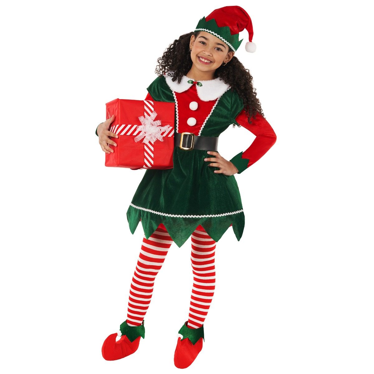 Girl in a green velour Christmas elf costume with a white fluffy pom-pom-trimmed collar, striped tights, a pom-pom hat, and red boot covers