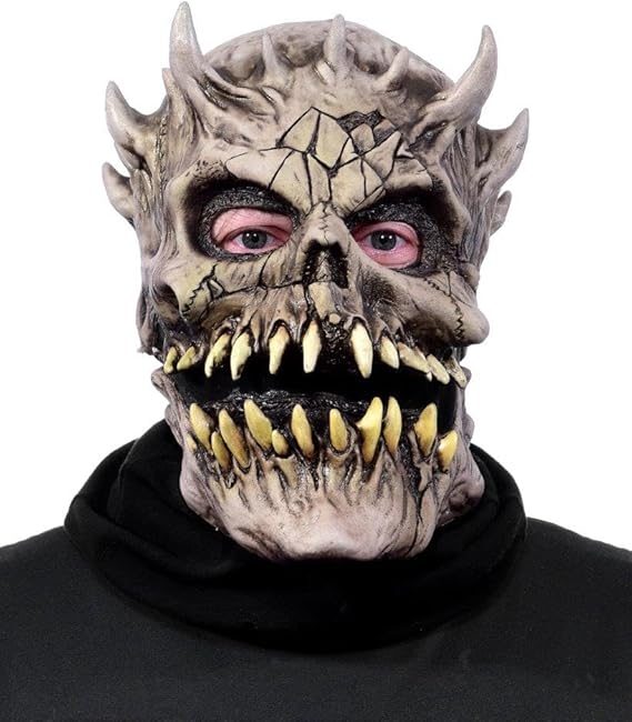 Person wearing a detailed red and black devil king latex mask with horns over dark clothing