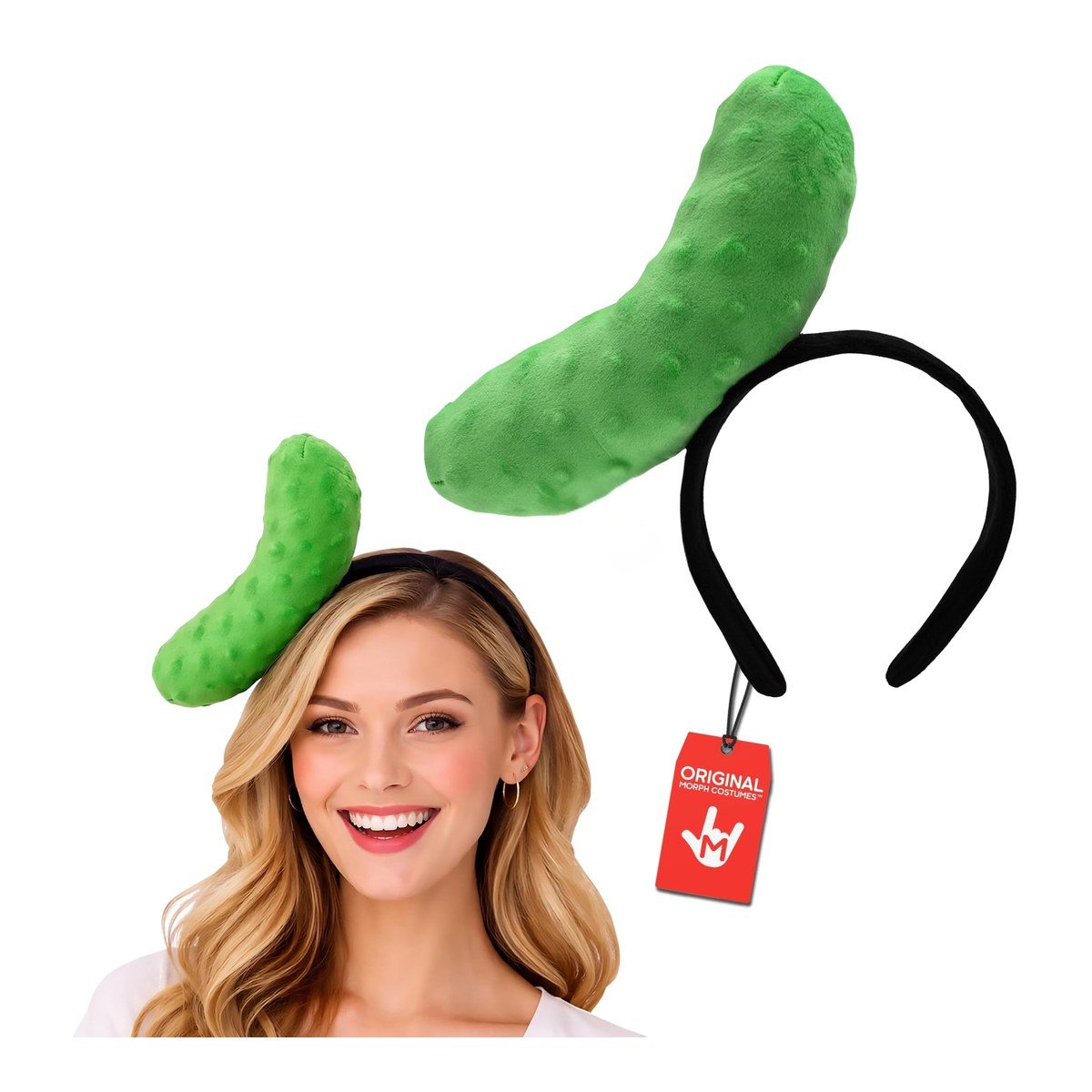 A bumpy green plush pickle on a black headband, shown on a white background and worn by a smiling woman