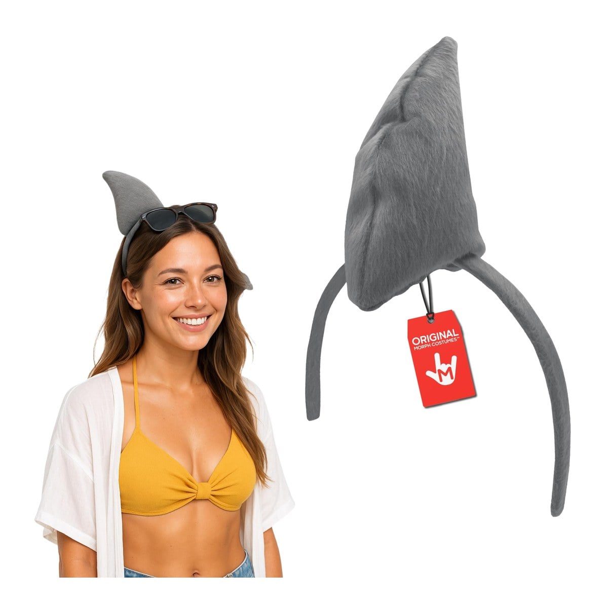 Smiling woman in a yellow top wearing a gray plush shark fin headband, next to the headband laid flat
